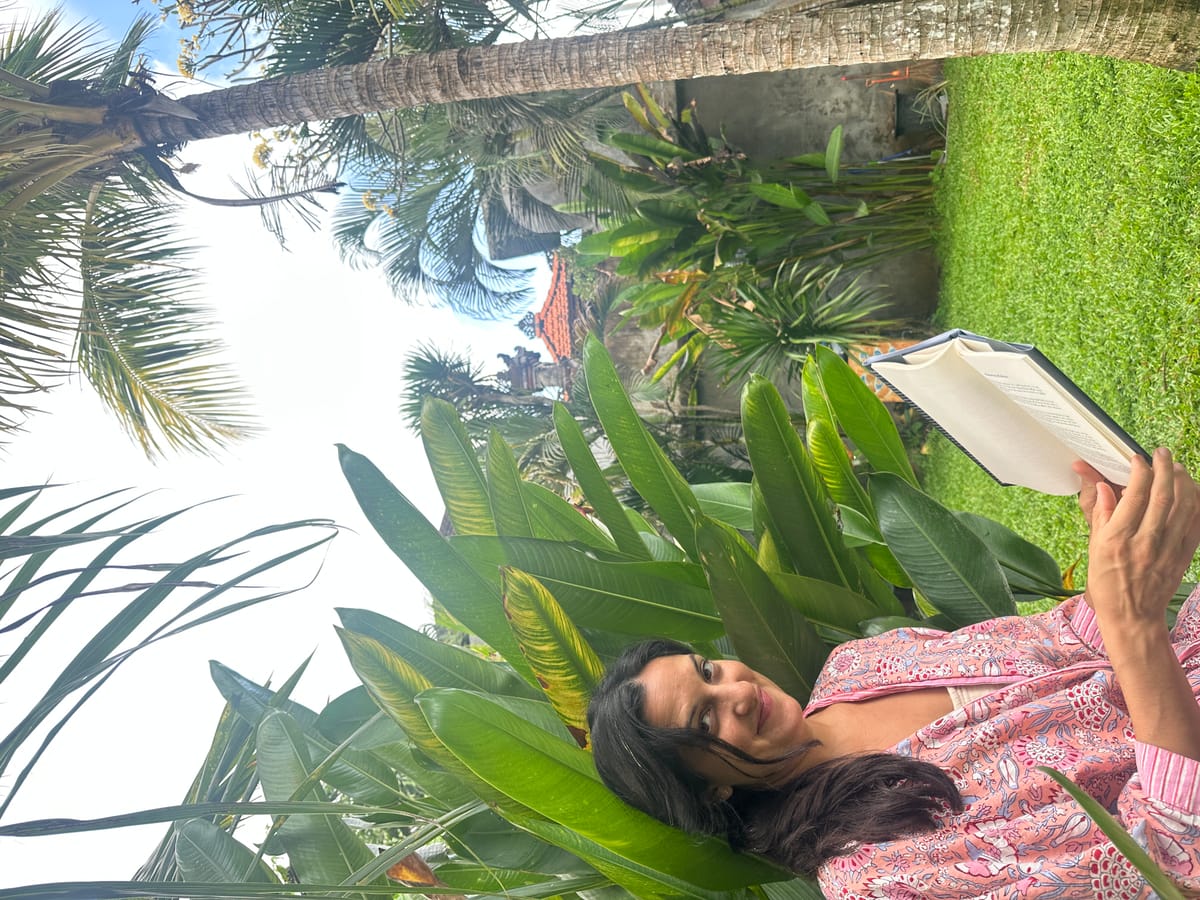 reading outside our courtyard