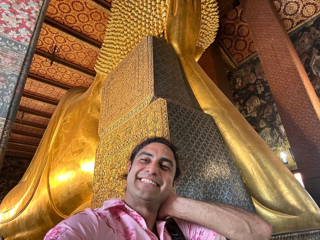 Bijan at a temple in Thailand